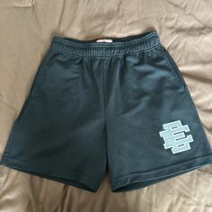 Eric Emanuel Ee Basic Mesh Shorts, Black With Silver Logo. Unworn Condition, No Bag. Size M Casual Silver Bottoms Short Length, Casual Silver Short Bottoms, Silver Bottoms With Built-in Shorts, Casual Silver Bottoms For Streetwear, Eric Emanuel Shorts, Eric Emanuel, Classy Outfits Men, Batman Artwork, Silver Logo