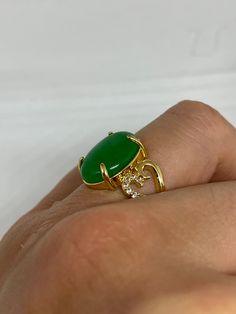 Vintage Lucky Green Nephrite Jade ring Large green nephrite jade Ornate gold finished White bronze Vintage ring, does not tarnish, NOT sterling Size 6.5. 7, 7.5 or 9 My jeweler can custom re size for a $10-$20 fee All rings are shipped free in the US in a nice gift box. Check out our over a THOUSAND great reviews Engraving is $4 per letter and is not always perfect depending on the piece. It can take a few days if the jeweler is busy. This is payable to Paypal Judithsltd@gmail.com Oval Jade Rings In Yellow Gold, Yellow Gold Jade Ring With Gemstone, Gold Chrysoprase Ring, Gold Oval Chrysoprase Emerald Ring, Gold Chrysoprase Rings For Anniversary, Gold Jade Emerald Ring, Fine Jewelry Gold Jade Rings, Gold Jade Rings In Fine Jewelry Style, Fine Jewelry Gold Rings With Jade