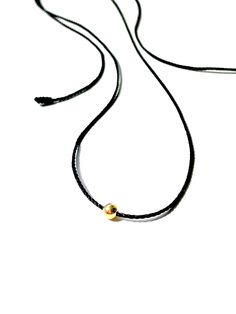 "Black cord string choker rope necklace with 14k real gold bead Handmade and custom made to your own length and safe to get wet Handmade with lots of Love and care in our workshop Pretty gift wrap included - see photo gallery  Free shipping in USA Ready to ship today  Safe to get wet Made in USA ♡ 𝗖𝗵𝗼𝗸𝗲𝗿𝘀 https://etsy.me/3DF6cYD 𝗦𝗲𝗻𝗱 𝗮 𝗴𝗶𝗳𝘁 𝗺𝗲𝘀𝘀𝗮𝗴𝗲 There is a feature called \"Add a gift message for free\" when you checkout 𝗟𝗼𝘃𝗲 𝗶𝗻 𝗮 𝘀𝘁𝗿𝗶𝗻𝗴 We put all our heart Minimalist Gold Choker With Adjustable Length, Gold Minimalist Choker With Adjustable Length, Minimalist Black Jewelry With Sliding Knot, Trendy Gold Choker With Tiny Beads, Minimalist Gold Beads Necklace, Minimalist Choker Necklace With Sliding Knot, Black Necklace With Sliding Knot For Gifts, Minimalist Black Choker With Adjustable Length, Minimalist Everyday Choker With Round Beads