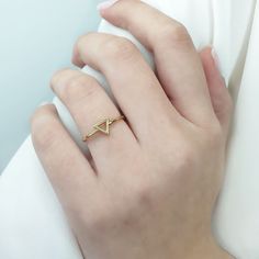 Tiny triangle ring, 9K 14K 18K Solid Gold, Triangle shape ring, Everyday geometric jewelry, Triangle geometric men's, Gold ring gift for her This tiny triangle ring has a minimal design, and you can wear it any day and combine it with other jewelry . It makes for an excellent gift for a loved one, without being extravagant. - Gold Kt: 9K, 14K and 18K Solid Gold - We can make all three Gold Colors: Rose Gold, Yellow Gold, White Gold - Band: 1,2mm ✔ Ready to Ship in 7-10 Business Days Each one of Triangle Ring Design, Minimalist 14k Gold Geometric Jewelry, Minimalist Geometric Jewelry In 14k Gold, Minimalist Geometric 14k Gold Jewelry, Yellow Gold Trillion Cut Diamond Ring For Gift, Trillion Cut Yellow Gold Diamond Ring For Gift, Trillion Cut Yellow Gold Diamond Ring As Gift, Minimalist Diamond Cut Signet Ring For Promise, Minimalist Trillion Cut Rings For Anniversary