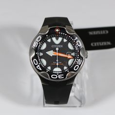 Item No. BN0230-04E Citizen Promaster Orca Stainless Steel Case Men's Divers Watch BN0230-04E Watch Features: Quartz Movement Eco-Drive Caliber: E168 Stainless Steel Case Polyurethane Strap Luminous Hands Luminous Markers Mineral Crystal Buckle Clasp Case Diameter: 46mm Case Thickness: 15mm Lug Width: 14mm Water Resistance: 200 Meters Screw Down Crown Unidirectional Bezel Free Priority Shipping on all orders in continental U.S. Shipping time is usually between 2 and 6 day's. 1 day handling time. Divers Watch, Authentic Watches, Eco Drive, Minerals Crystals, Quartz Movement, Stainless Steel Case, Wrist Watch, Buckle, Stainless Steel