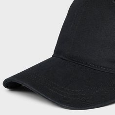 Keep your head and face shaded from the sun while looking your stylish best with this Baseball Hat from Universal Thread™. Made from 100% cotton for all-day comfort, it features a pull-on style for easy wear. Plus, the adjustable strap provides a snug, custom fit. Pair it with any of your favorite outfits for long walks or jogs or days at the beach to help beat the heat and shield your eyes. Universal Thread™: The denim collection that's true to you. Black Cotton Hat For Summer, Summer Cotton Hat In Black, Black Cotton Summer Hat, Summer Black Cotton Hat, Adjustable Cotton Hats With Uv Protection, Casual Uv Protection Hat, Black Baseball Cap With Curved Visor For Spring, Casual Brimmed Hat With Adjustable Fit, Black Curved Bill Dad Hat For Spring