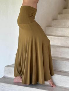 women's plant based rayon jersey stretchy golden brass color hourglass convertible maxi skirt and dress #color_brass Versatile Full-length Stretch Skirt, Flowy Lined Skirt Bottoms In Solid Color, Flowy Solid Bottoms With Lined Skirt, Flowy Solid Color Lined Skirt, Versatile Fitted Skirt, Versatile Solid Color Flared Maxi Skirt, Versatile Full Length Lined Skirt Bottoms, Versatile Stretch Maxi Skirt For Spring, Versatile Fitted Maxi Skirt For Summer