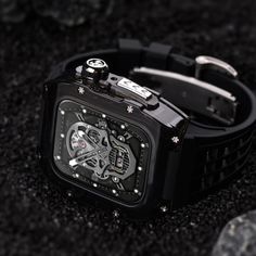 Elevate your Apple Watch with the Glacier Case by GravGoods – where high-end fashion meets rugged resilience. This crystal-like case and comfy rubber strap transform your watch into a stunning piece of tech and luxury. Plus, seamless compatibility with wireless chargers. Crystal Clarity: A unique, transparent design that adds a luxurious, high-end look to your Apple Watch. Shockproof Durability: Engineered for protection, it guards against shocks and bumps with ease. Comfort Meets Style: Crafted Modern Rectangular Outdoor Watch, Black Rectangular Watch Accessories For Outdoor, Black Rectangular Watch Accessories For Outdoors, Apple Watch Sizes, Apple Watch Case, Transparent Design, High End Fashion, Watch Case, Wireless Charger