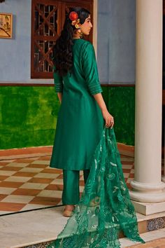 Forest green chanderi kurta with silver zari applique embroidery. Comes with pant and a dupatta.
Components: 3
Pattern: Applique embroidered
Type Of Work: Zari
Neckline: V Neck
Sleeve Type: Three quarter
Fabric: Chanderi
Color: Green
Other Details: 
Length:
Kurta: 48 inches
Pant: 39.5 inches
Model Height: 5ft 8inches, wearing size S
Occasion: Sangeet - Aza Fashions V Neck Kurta, Kurta Pant Set, Applique Embroidery, Kurta With Pants, Pant Set, Embroidery Applique, Set For Women, Aza Fashion, Model Height