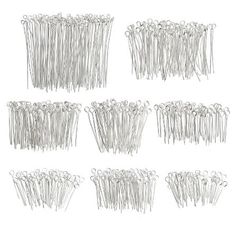 six pairs of silver colored hair pins on a white background with clippings attached to them