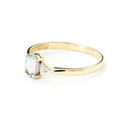 Item: 1233 Description 14k. Solid Gold Ring With Diamonds & Aquamarine (Yellow Gold) Original Ring Size 7.0 (More Sizes Upon Request) A 14 Karat Ring With A Sparkling Natural Aquamarine Is Matched Side By Side With Genuine Diamonds. Item Information Metal: 14k. Solid Gold Metal Weight: 1.25 Gr. Diamonds 2 Round Cut, K-M Color, I-3 Clarity = 0.01 Ct Center Gemstone 1 Oval Shape, 6x4 Mm, Aquamarine = 0.45 Ct Measurements Height: 0.85 In ( 21.6 Mm) Width: 0.24 In ( 6.1 Mm) Aquamarine Gem, Being In Love, Aquamarine Colour, Simple Band, Solid Gold Ring, Solid Gold Rings, Understated Elegance, Natural Aquamarine, March Birth Stone