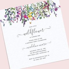 an image of a wedding card with flowers on the front and bottom, which reads our little wildflowers it's turning one birthday party