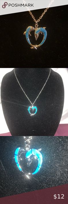 💰Buy 2 Get 1! Heart Shaped Dolphin Necklace💰 ⚡️Cute silvertone and turquoise blue dolphins in the shape of a heart. Silvertone chain.⚡️ Bundle items with ⚡️for a discount. Buy 2 get 1 of equal or lesser value free Wish Jewelry Necklaces Blue Heart Cut Jewelry For Party, Blue Open Heart Jewelry Gift, Blue Open Heart Jewelry For Gift, Blue Jewelry For Valentine's Day Party, Blue Heart Beads Heart-shaped Jewelry, Blue Heart Necklaces For Party, Blue Heart Pendant Jewelry For Party, Blue Heart-shaped Jewelry With Heart Beads, Blue Open Heart Necklace For Gift