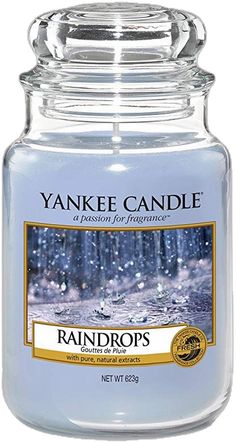 yankee candle with raindrops on the front and bottom, in a glass jar