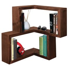 two wooden shelves with books, vase and other items on top of each shelf in the shape of an open bookcase