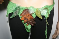 Ready To Ship ~ Beautiful Woodland Leaf Pixie Fairy Felt Belt/Skirt/Scarflette. Unique. Versatile Item. One Of A Kind Wearable Art. Makes a lovely gift! Comes wrapped gift!  White Tutu Skirt Not Included. Top And Necklace sold separately.  You will be the only one in the world to wear this hand made felt item! Each item that I make is slightly different because it's hand made and colours vary. You will be receiving the actual item in these photos, it's already made and ready to send to you. This Belt/Skirt/Scarflette has been wet felted by myself. It does up at the back with cord straps. The leaves were also made by myself using wet felting teqnique. I have sewn extra detail onto these leaves on my sewing machine. Natural, rustic...I hope you love it! Hand made by myself in a smoke-free, p Felt Belt, White Tutu Skirt, Pixie Fairy, Belt Skirt, White Tutu, Pixies Fairies, Wet Felt, Skirt Belt, Wet Felting