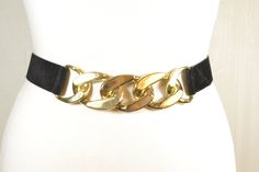 Black Gold V-shaped Belt: Full length end to end: 35''/88 cm Minimum wearable length: 35''/88 cm Maximum wearable length: 41''/105 cm Width: 1.2''/3.5 cm In a good vintage condition. See my wide collection of other vintage belts: https://www.etsy.com/shop/RetroBelt?ref=seller-platform-mcnav Big Gold Chains, Elastic Belt, Vintage Belts, Suspender Belt, Suspenders, V Shape, Belt Bag, Gold Chain, Gold Chains