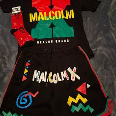 Malcolm X Shirt Colors: Black Size: Large Retail: $38 Malcolm X Shorts Color: Black Size: Large Retail: $50 Malcolm X Socks Color: Red Size: 6-12 Retail: $10 ((Brand New)) White Graphic Tee, Malcolm X, Designer Streetwear, Diy Sewing Clothes, Dye Shirt, Streetwear Tshirt, Bear T Shirt, Red Shorts, Short Socks