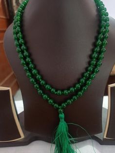 108 Beads Natural green onyx Japa Mala Prayer Beads semi-precious Gemstone Round Beads // Long Tassel Necklace// Meditation japa mala // Guru bead// Necklace Yoga Beads green Color // 8 mm Bids size - 8mm approx Z Green Necklace color - green It is known as the 'love stone' as the message it emits is the strong vibration of unconditional love, joy, warmth and healing. As quartz crystals are profound amplifiers of energy, it may help to kindle happiness, love, romantic feelings and sensuality. It Traditional Green Faceted Beaded Necklaces, Traditional Green Faceted Beaded Necklace, Traditional Green Agate Necklace, Beaded Agate Mala With Round Beads, Spiritual Green Malachite Beaded Bracelets, Green Malachite Spiritual Beaded Bracelets, Green Spiritual Beaded Bracelets With Faceted Beads, Spiritual Green Beaded Bracelets With Faceted Beads, Green Jade Necklace With 108 Beads