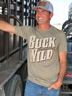 Buck Wild Graphic Tee by Texas True Threads Casual Brown T-shirt For Outdoor, Khaki Graphic Tee With Graphic Print, Khaki Crew Neck T-shirt For Outdoor, Elsie De Wolfe, Gifts For Hubby, Brown Jeans, Hey Dude, Mens Graphic Tee, Slim Waist