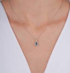 "Blue Topaz Necklace/ Pear Cut London Blue Topaz Necklace with Side Diamonds / 14K White Gold Pendant / Minimalist London Blue Topaz Halo Pendant I especially prefer minimal designs and love to create or produce them. They can fit in our daily life and we easily can integrate and be whole with them. This lovely London Blue Topaz Necklace is to be with you in your every second, to be whole, to become you.  ╰► Specifications ➤ Made to Order.  ➤ Made in Turkey. ➤ 14K White Gold ➤ Custom Gold Color: Rose Gold, Yellow Gold, White Gold ➤ Total CTW: 0.53 Carat ➤ Setting Type: Prong Halo ➤ Natural Earth-Mined & Non-Conflict Diamonds & Gemstone ➤ Ready to Ship in 1 Week ╰► Center Stone Specifications ➤ Gemstone: Natural Topaz ➤ Shape: Pear Cut London Blue Topaz ➤ Weight: 0.45 Carat ➤ Color: London Luxury White Topaz Necklace, Pear-shaped Blue Topaz Gemstone Jewelry, Blue Topaz Pear-shaped Necklace, Blue Pear-shaped Blue Topaz Necklace, Galaxy Stuff, London Blue Topaz Necklace, Necklace With Diamonds, Pendant Minimalist, Blue Topaz Necklace