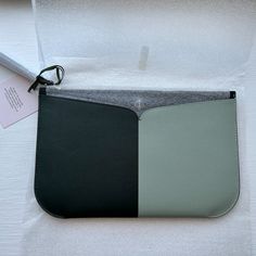 Material Smooth Italian Leather Features Large Wristlet Interior Credit Card Pocket 6"H X 10"W Imported Style No. Pwru7164-1 Modern Clutch Wristlet For Daily Use, Modern Wristlet Clutch For Daily Use, Rectangular Kate Spade Clutch For Travel, Kate Spade Zipper Pouch For Everyday Use, Kate Spade Everyday Zipper Pouch Bag, Kate Spade Rectangular Travel Clutch, Kate Spade Rectangular Clutch For Travel, Modern Laptop Sleeve Clutch Pouch, Green Envelope Clutch For Everyday Use