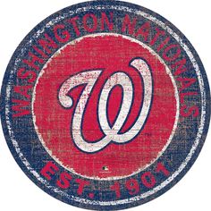 the washington nationals logo is painted on an old, worn - out baseball team sign