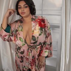 Experience the Beauty of the Peach Garden Floral robe The Peach Garden floral robe combines soft peach tones with vibrant floral prints for an elegant touch. Perfect for lounging or unwinding, this floral robe offers a luxurious feel with effortless style. Elegant long sleeve, long robe, kimono with invisible side seam pockets. Exclusive QWR pattern features a soft peach hue with oversized bold floral peony patterns in red, yellow and green florals for a fresh, garden-inspired look. Prominent co Feminine Open Front Robe For Loungewear, Floral Print Sleepwear With Kimono Sleeves, Pink Spring Robe For Relaxation, Feminine Floral Print Robe For Loungewear, Floral Print Kimono Sleeves Sleep Robe, Pink Long Sleeve Robe With Floral Print, Pink Robe For Spring Relaxation, Pink Floral Print Kimono For Loungewear, Pink Floral Print Open Front Kimono