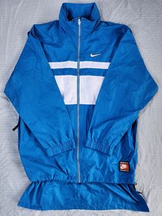 Vintage 1990s Blue White Nike Fleece Windbreaker Jacket  In good condition  Normal wear  Some stains (see pictures) Medium 30 Collar to bottom of waist x 26.5 Pit to Pit 36 to bottom of flap Any questions feel free to reach out! Cheap Blue Windbreaker For Winter, Cheap Blue Windbreaker For Fall, Affordable Blue Windbreaker For Winter, Cheap Blue Sporty Windbreaker, Cheap Sporty Blue Windbreaker, Cheap Blue Nylon Windbreaker, Cheap Vintage Blue Windbreaker, Willy Wonka Halloween, Nike Fleece