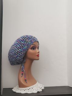 Add some unique style to your wardrobe with this handmade Dragonfly Crochet Dreadlock Tam with drawstring Slouchy Hat. Perfect for any season, this beanie is made with acrylic material and features a beautiful  pattern in monet color. The hat is designed with a reggae character and boho theme, making it perfect for casual occasions and outdoor activities. This stretchy hat comes in size L and is suitable for both men and women. The tam is carefully handmade in the United States, ensuring quality and uniqueness. The hat features a crochet fabric type and has a drawstring slouchy design for comfortable wear. Add this Hippie, Love, and Christmas-inspired hat to your collection today and enjoy a one-of-a-kind fashion statement. Casual Beach Bonnet One Size, Bohemian Beanie Headwrap, Casual One-size Beach Bonnet, Adjustable Bohemian Winter Headwrap, Trendy Adjustable Bonnet, Bohemian Winter Headwrap One Size, Casual Acrylic Bonnet One Size Fits Most, Bohemian One Size Winter Headwrap, Bohemian One-size Winter Headwrap