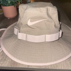 Nike Bucket Hat! Excellent Condition, Never Worn Outdoors. No Marks Whatsoever. Basically Brand New Without Tags! Beige Color Way. Cream Nike Hat, Nike Korea Hat, Beige Nike Hat, Nike Cap Beige, Nike Bucket Hats, Nike Adjustable Hats For Outdoor, Nike Outdoor Hats With Curved Brim, Nike Adjustable Outdoor Hats, Nike Adjustable Spring Hats