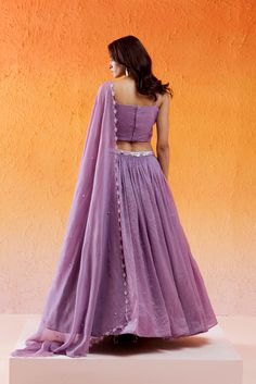 Featuring a lavender lehenga set in crushed organza base with sequin, resham, cutdana and moti hand embroidery with cutwork dupatta. It is paired with a matching embroidered crushed organza blouse and an organza cutwork dupatta. Lavender Zari Work Sets For Wedding, Lavender Zari Work Wedding Sets, Lavender Wedding Sets With Zari Work, Lavender Wedding Set With Zari Work, Lavender Lehenga With Zari Work For Wedding, Lavender Wedding Set With Sheer Dupatta, Lavender Sharara With Sheer Dupatta For Wedding, Lavender Anarkali Sets For Receptions, Lavender Wedding Choli With Resham Embroidery