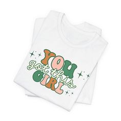 Empower yourself with our "You Got This Girl" Women's Graphic Tee. This shirt features an uplifting quote that encourages strength and confidence. It's not just apparel; it's a source of positive vibes and motivation. Perfect for everyday wear, workouts, or as a thoughtful gift for the women in your life. Available in various sizes, this tee is a stylish way to make a statement and embrace the power of self-confidence. Limited edition, so grab yours now! .:Unisex Fit, refer to size guide for more info .:Multiple Tee Color Choices Inspirational Quotes For Girls, Uplifting Gifts, Apparel Merchandising, Quote Shirt, Empower Yourself, Graphic Tees Women, Shirts With Sayings, Inspirational Quote, Color Choices