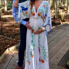 5favorite Gorgeous Embroidered Maternity Gown. Ships In 14-16 Days. Words Can’t Describe How Beautiful This Piece Is. Similar To Fillyboo “Strange Magic” Gown. This Is Oversized And Designed To Fit Allthis Is One Size, Sizes Are Listed As Reference. Bust-130cm Sleeve-40cm Length-135cm White Embroidered Maxi Length Gown, White Embroidered Maxi Gown, Embroidered V-neck Maxi Dress For Wedding, White Maxi Length Gown With Floral Embroidery, V-neck Embroidered Maxi Dress For Wedding, White Maxi Gown With Floral Embroidery, White Floral Embroidered Maxi Gown, White Bohemian Embroidered Gown, Fitted Bohemian Maternity Dress In White