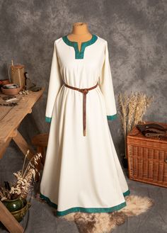 The dress has simple medieval cut with long sleeves, loose and comfortable. The historical pattern - an important element when playing historical realities, especially Vikings or Slavs. Put on your cloak and travel back to the Middle Ages. Hunting, ancient legends, the warmth of the hearth and our dress will give you an unforgettable experience. The simple cut of the dress allows you to move freely, as well as boldly add accessories to the dress. The dress will perfectly fit into the basic wardr Fall Medieval Dress With Long Sleeves, Long Sleeve Medieval Dress With Historical Design For Fall, Fall Medieval Dress With Historical Design, Peasant Style Long Sleeve Costume Dress, Peasant Style Medieval Dress With Long Sleeves, Viking Style Medieval Dress With Long Sleeves, Viking Style Long Sleeve Medieval Dress, Long Sleeve Medieval Dress With Historical Design, Long Sleeve Dresses For Medieval Festivals