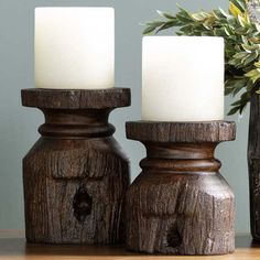 Introducing the Heritage Farmstead Candle Holders (2 pc), reminiscent of a cozy cabin banister. Crafted from durable resin, these candle holders in a rich brown wood finish add rustic charm and stable support for pillar candles (not included). Resin Large: 5"W x 5.5"D x 8"H; Small: 5.5"W x 4.5"D x 6.5"H Brown Candles not included Big Candle Holders, Large Wooden Candle Holders, Big Candle Holder, Antler Candle Holder, Western Candle Holders, Western Candles, Rustic Wood Candle Holders, Farmhouse Candle Holders, Brown Candles