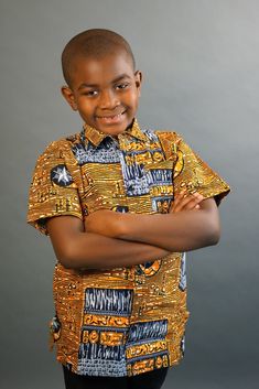 This short sleeved African Print shirt is real cute. Dress him up in this cute African outfit and he will attract a lot of attention and draw tons of compliments. He can wear it whenever he wants to project his African Identity. He can wear it to church, during Sankofa, Kwanzaa, and any African American or Afrocentric Cultural event. *Hand Sewn African Dress *Made by Local Artisans in Africa *100% Cotton *Made in Ghana *Portions of proceeds donated to charities in Africa *Everything in stock is Printed Cotton Half Sleeve T-shirt, Casual Yellow Tops With Half Sleeve, Casual Yellow Half Sleeve Top, Cotton Half Sleeve Shirt With Graphic Print, Multicolor Printed Camp Shirt With Short Sleeves, Multicolor Printed Short Sleeve Camp Shirt, Printed Cotton Half-sleeve T-shirt, Printed Half Sleeve Cotton T-shirt, Half Sleeve Printed Cotton T-shirt