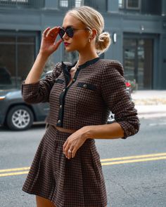 True to Size 100% Polyester Hand Wash Cold. Dry Flat High Rise Pocketed Front Zipper and Hook Closure Not Lined Posh meets preppy in the Tres Fabulous Houndstooth Shorts in brown and black that features a high rise.Styled with: Stella Clutch. Tres Jacket. and Fantasy Heel.---SIZE AND FIT---Model is Wearing a Size Small. Height is 5'8"". Bust is 35â€? Waist 26â€? and Hips 36â€?/span> Size S: Length measures 14.75â€?from waist to hem with a 11â€?rise. 2.25â€?inseam and 26â€?waist Size M: Length measures 15â€?from waist to hem with a 12â€?rise. 2.5â€?inseam and 28â€?waist Size L: Length measures 16â€?from waist to hem with a 112.5â€?rise. 3â€?inseam and 30â€?waist Preppy Short Bottoms For Fall, Preppy Short-length Bottoms For Fall, Preppy Short Length Bottoms For Fall, Brown Houndstooth Bottoms For Workwear, Brown Houndstooth Bottoms For Work, Shoulder Jacket, Select Shop, Front Zipper, Fitness Models