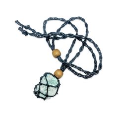 Mesmerizing Mesh Gemstone Necklace with Amazonite - Elevate Your Style with Natural Elegance Introducing the Necklace - Mesh Gemstone - Amazonite! This stunning piece features a braided rope pendant in the shape of a braided cage, holding a raw gemstone that will make you stand out from the crowd. The Amazonite gemstone not only looks beautiful but also has calming and soothing properties. It is said to help with communication and balance, making it the perfect accessory for those stressful days Spiritual Jewelry With Natural Stones And Waxed Cord, Spiritual Jewelry With Natural Stones On Waxed Cord, Unique Hand Wrapped Jewelry With Waxed Cord, Unique Hand Wrapped Jewelry On Waxed Cord, Bohemian Crystal Necklaces With Raw Stone, Handmade Cord Spiritual Jewelry, Bohemian Adjustable Raw Stone Necklace, Bohemian Adjustable Crystal Necklaces With Raw Stone, Spiritual Turquoise Jewelry With Adjustable Cord