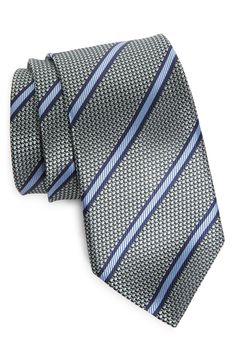 The Italian luxury fashion house brings its timeless elegance to a diagonally striped jacquard tie masterfully crafted in Italy from rich Mulberry silk. 100% silk Dry clean Made in Italy Elegant Striped Suit And Tie Accessories For Black Tie, Elegant Pinstripe Standard Tie, Elegant Pinstripe Ties For Business, Elegant Striped Ties For Office, Elegant Striped Suit Accessories For Workwear, Elegant Striped Ties For Work, Bold Stripes, Italian Luxury, Fashion House