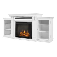 a white entertainment center with an open fire place