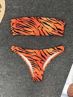 Sku CY-!26248 Material Polyester Style Bralette , Padded Feature Thong , Leopard Occasion Beach , Hot Springs , Swimming Pool Type Bikini Swimsuit Color ZEBRAS,ORANGE,LEOPARD Size S,M,L Size chart: Please consult the size chart we provide for this item's measurements to help you decide which size to buy. Please note: There may be 1-3cm differ due to manual measurement. CMINCH Cm Cup Bust Waist Hips S A-B 72-80 60-66 78-85 M B-C 80-88 64-70 85-91 L C-D/E 88-95 68-72 91-97 Orange Tropical Stretch Swimwear, Tropical Orange Stretch Swimwear, Orange Tropical Swimwear, Tropical Style Orange Stretch Swimwear, Orange Bandeau Swimwear For Beach, Orange Bandeau Swimwear For Summer, Orange Bandeau Swimwear For The Beach, Printed Bandeau Swimwear For Beach, Summer Orange Bandeau Swimwear