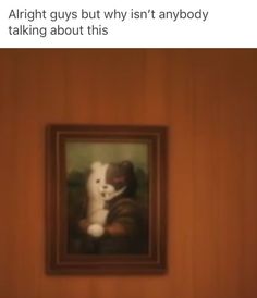 an image of a cat with a frame on the wall above it that says, alright guys but why isn't anybody talking about this