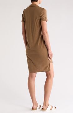 A classic button front shirt dress in a comfortable slubbed knit offers casual style. Spread collar Short sleeves with upturned cuffs Front button closures Solid color High-low hem Unlined 51% cotton, 49% modal Machine wash cold, tumble dry low Imported Model’s stats for sizing: 5’10” height, 34” bust, 27” waist, 35” hips. Cotton V-neck Shirt Dress For Fall, Casual Dresses With Button Cuffs In Relaxed Fit, Casual Solid Shirt Dress With Button Closure, Casual Solid Knee-length Shirt Dress, Casual Solid Color Shirt Dress For Fall, Casual Knee-length Shirt Dress, Casual Knee-length Relaxed Fit Shirt Dress, Casual Shirt Dress With Relaxed Fit For Fall, Casual Solid Dress With Button Cuffs