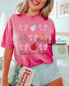 Teacher life coquette comfort colors shirt.  This Trendy teacher shirt states teacher life coquette and school supplies. For trendy oversized shirt look, size up 1 or 2 sizes. Thank you! COMFORT COLORS  UNISEX FIT  100% cotton  OVER SIZE LOOK SIZE UP 1 OR 2 SIZES  HOW ITS MADE  Everything is handmade by me in my home. All Designs are hand placed and professionally heat pressed to seal the image to the fabric. HOW TO WASH  Wash Inside out in cold Water  Tumble dry on low  Don't use bleach or Fabr Preppy Short Sleeve School T-shirt, Preppy Short Sleeve T-shirt For School, Pink School Spirit T-shirt For Back To School, Trendy Teacher Appreciation T-shirt For Back To School, Cute T-shirt For Back To School Teacher Appreciation, Cute T-shirt For Teacher Appreciation Back To School, Pink School Spirit T-shirt For School, Pink T-shirt For End Of School Year, Cute Spring College T-shirt