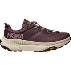 The HOKA ONE ONE Transport is a sporty women's everyday comfort shoe designed with the city-dweller in mind that is geared for walking, biking, or hiking. These HOKA ONE ONE Transport Smokey Quartz/Oat Milk Mesh Women's Shoes have the following features: Cordura abrasion resistant textile upper delivers enhanced protection against scuffs Quick toggle lacing designed for easy on and off 360-degrees of reflectivity Provides higher visibility Compression molded EVA midsole with 30% sugarcane provid Hoka Transport, Athleisure Shoes, Athleisure Sneakers, Comfort Shoe, On To The Next, Trending Sandals, Hoka One One, Flip Flop Shoes, Trail Shoes