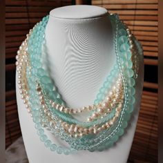 This Listing Is For An 8 Strand Of Richelieu Faux Pearls, Frosted, Muted, Light Blue And Acrylic Beads, With Clear Strung Beads. It Is In Excellent Condition, Old Stock, Complete With Tags, Never Worn. It Is A Rare, Eight Strand Necklace, Measuring 17" Long, Including The Clasp, No Extender. I Have A Similar Necklace Listed In My Closet With Light Aqua Beads, As Shown In The Last Photo. This Listing Is Only For The Seafoam Necklace. Buy With Confidence, Careful Packaging Promised. I Love To Bund Elegant Light Blue Single Strand Beaded Necklace, Elegant Light Blue Necklace With Beaded Chain, Elegant Light Blue Beaded Chain Jewelry, Elegant Light Blue Beaded Jewelry, Elegant Light Blue Beaded Chain Necklaces, Elegant Light Blue Beaded Chain Necklace, Elegant Light Blue Beaded Necklace, Blue Pearl Beaded Necklace For Party, Elegant Blue Pearl Necklace With Colorful Beads