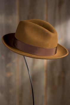 Our wide brim wool felt fedora boasts a deep center crease through the A-crown, a grosgrain band with a bow, and a snap brim. Free shipping   returns. Classic Fall Hat, Classic Top Hat For Fall, Classic Fitted Hat Bands For Fall, Classic Fitted Fedora For Fall, Classic Brown Panama Hat For Formal Occasion, Classic Fitted Top Hat For Fall, Classic Brown Formal Panama Hat, Vintage Brimmed Panama Hat For Formal Occasions, Vintage Top Hat With Short Brim For Fall