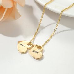 Celebrate love, family, or friendship with this beautiful Custom Engraved Heart Pendant Necklace. Available with the option to personalize 1 or 2 heart pendants, this delicate and timeless piece is the perfect way to keep your loved ones close to your heart. Each heart pendant can be engraved with a name, special date, or meaningful word, making it a truly unique and thoughtful gift for any occasion - from birthdays and anniversaries to Mother's Day or just because! KEY FEATURES: -Made with 316 Personalized Heart Pendant Charm Necklace For Best Friend, Heart-shaped Engraved Charm Necklace For Best Friend, Engraved Heart Charm Necklace For Best Friend, Personalized Double Heart Necklace For Best Friend, Customizable Heart-shaped Necklace For Best Friend, Customizable Heart-shaped Necklace For Best Friend Gift, Customizable Heart Necklace For Best Friend, Customizable Heart Necklace For Best Friend Gift, Customized Heart Jewelry For Best Friend