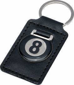 a black leather keychain with a eight ball on it