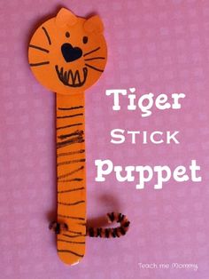 a paper tiger stick puppet with the words tiger on it