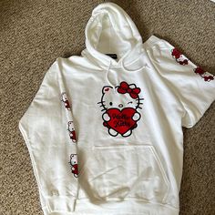 New Girl Order Hello Kitty Hoodie Size 10 Never Worn Cute White Fleece Top, Cute White Winter Hoodie, Cotton Hoodie With Cat Design For Streetwear, Winter White Hoodie With Cartoon Print, White Hooded Hoodie With Cartoon Print, White Hoodie With Cartoon Print, Hello Kitty Print Hooded Hoodie For Winter, Casual Hello Kitty Hooded Sweatshirt, Hello Kitty Print Hooded Winter Hoodie