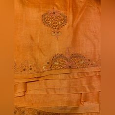 100% Silk, Highest Quality, With Very Beautiful Embroidery. Never Worn. Straight From India! Very Expensive. Will Sell Fast So Send In An Offer Asap! :) Orange Saree With Intricate Embroidery, Embroidered Silk Saree Set, Embroidered Orange Art Silk Sharara, Orange Embroidered Art Silk Sharara, Orange Embroidered Sharara With Traditional Drape, Bollywood Style Embroidered Tussar Silk Sharara, Embroidered Tussar Silk Saree Set, Elegant Embroidered Sharara With Multicolor Embroidery, Orange Embroidered Silk Sharara