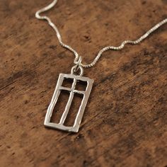 "This delicate window made of the cross signifies the relationship we have with Christ; only He truly knows our inner workings and desires.  The pendant measures 1\" long by 1/2\" wide. Available as a Pendant Only or on a 16\" or 18\" mini box chain.  Choose from the drop down menu under \"Style - select a style\" to specify your choice.   Solid Sterling Silver Jewelry, Unique Christian, Handmade in Texas by artist Shandon Camarillo-Whitson" Logo Jewelry, Faith Jewelry, Pierced Jewelry, Christian Jewelry, Soldering, Copper Jewelry, Bling Bling, Amazing Jewelry, Pendant Necklaces